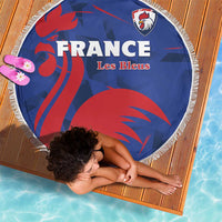 Round blue beach blanket with France crest, FRANCE and Les Bleus text, white fringe