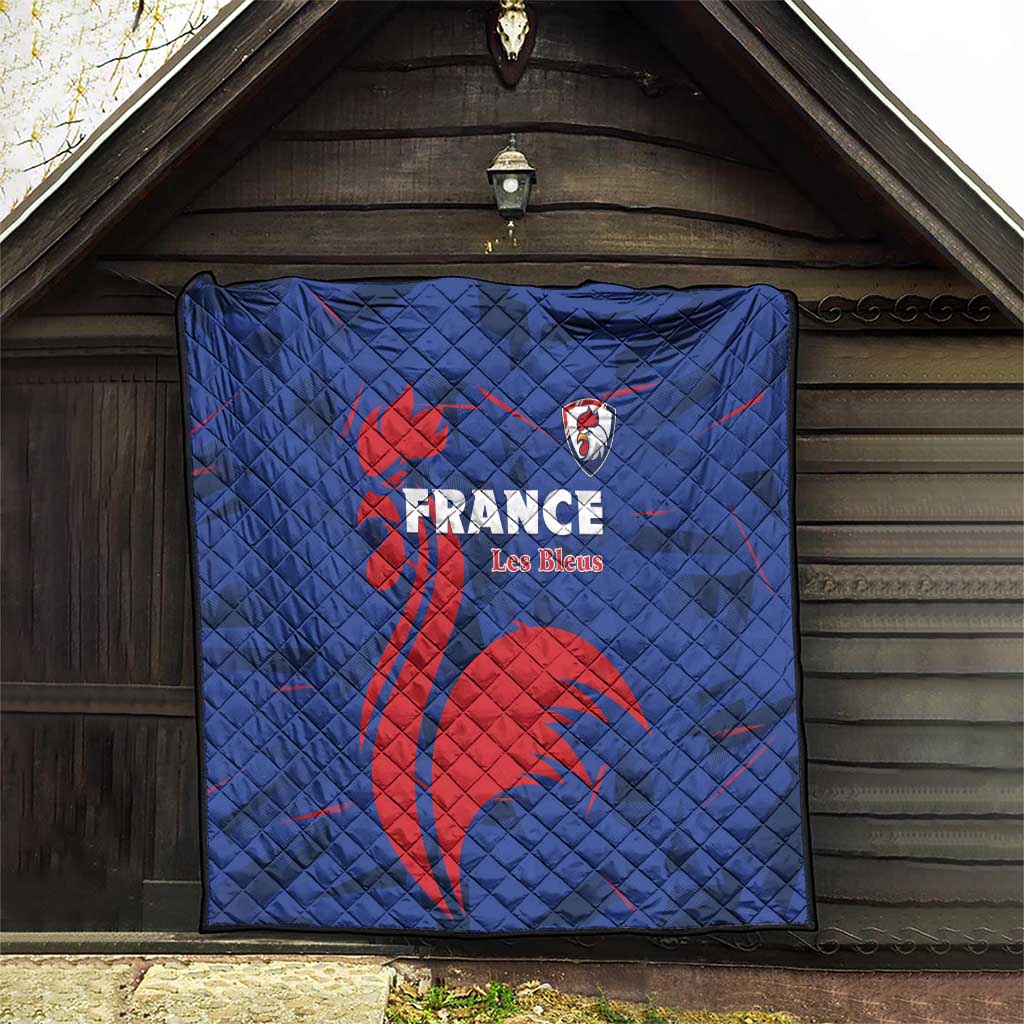 Blue France Les Bleus quilt hung on a wall with red rooster graphic and logo crest