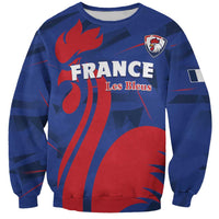 Blue rugby sweatshirt, crew neck, long sleeves, France Les Bleus crest and rooster graphic.