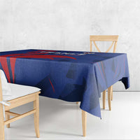 Blue France rugby tablecloth with red and navy abstract graphic design, draped over table