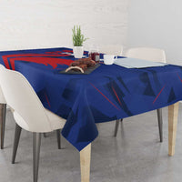 Blue France rugby tablecloth with bold red geometric shapes and abstract pattern on tabletop