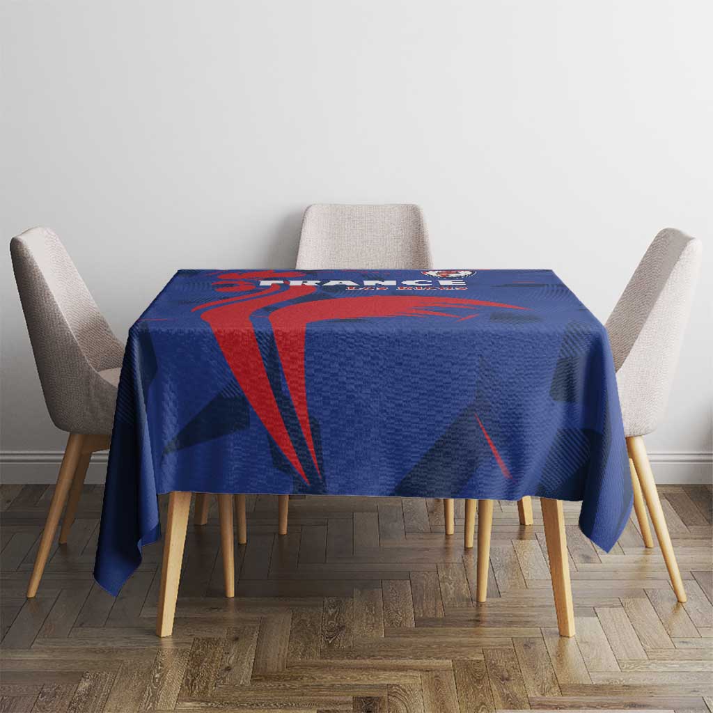 Blue France rugby tablecloth featuring red spear-like shapes and dark navy abstract blocks