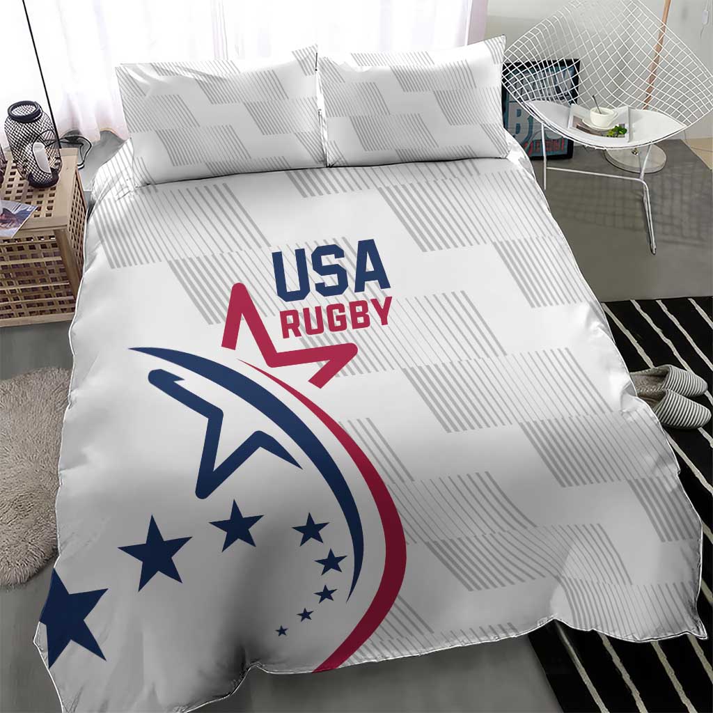 White bedding set with large USA Rugby logo on comforter, two matching pillowcases