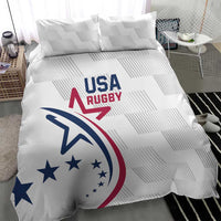 White bedding set with large USA Rugby logo on comforter, two matching pillowcases
