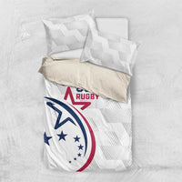 White bedding set top view with two pillowcases, USA Rugby crest on comforter