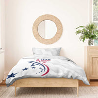 White bedding set with pillowcase and duvet, USA Rugby logo on a wood bed