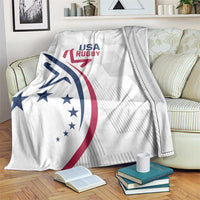 White rugby themed throw blanket with USA Rugby logo on sofa