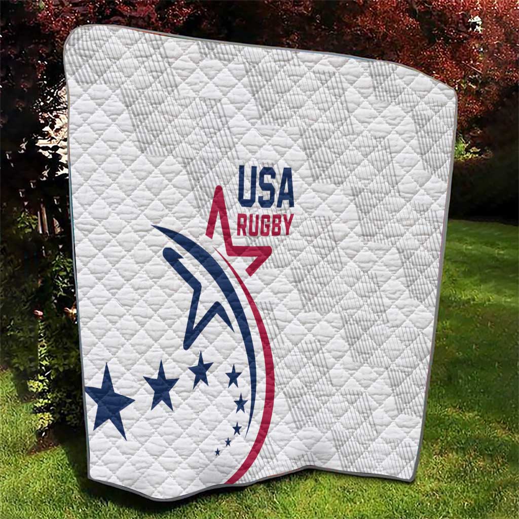White USA Rugby quilt on grass, quilted diamonds and blue red USA Rugby crest