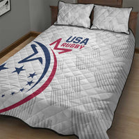 White quilt bed set with USA rugby text and blue/red emblem on quilted surface