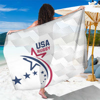 White USA rugby logo sarong towel with geometric stripe pattern, held up by hands