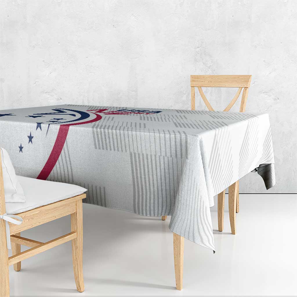 White USA rugby tablecloth with folded corner drop and blue red emblem on tabletop