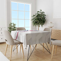 White USA rugby tablecloth on a dining table with matching chairs in view