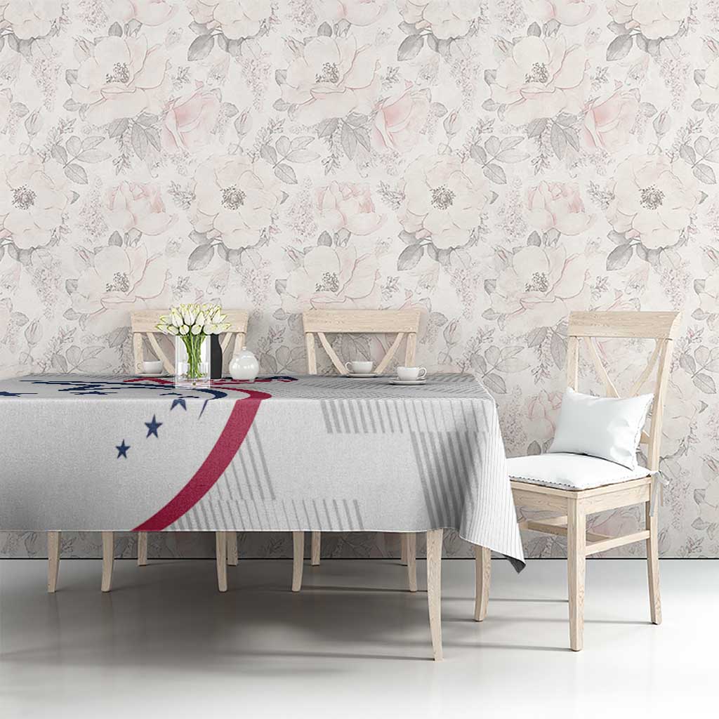 White rugby tablecloth with USA Rugby emblem and blue stars on the table front