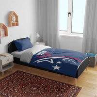 Blue USA rugby duvet cover set with two pillowcases on a bed frame, star crest artwork
