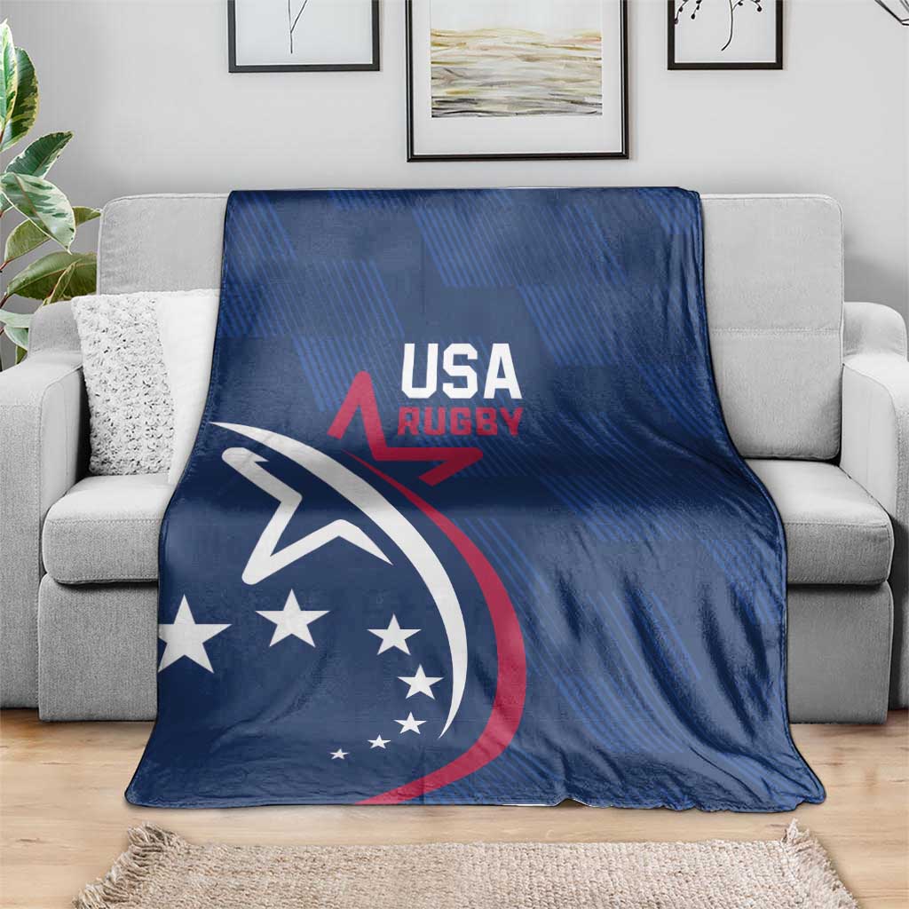 Blue USA Rugby blanket draped on a gray sofa, with eagle and USA stars graphic.