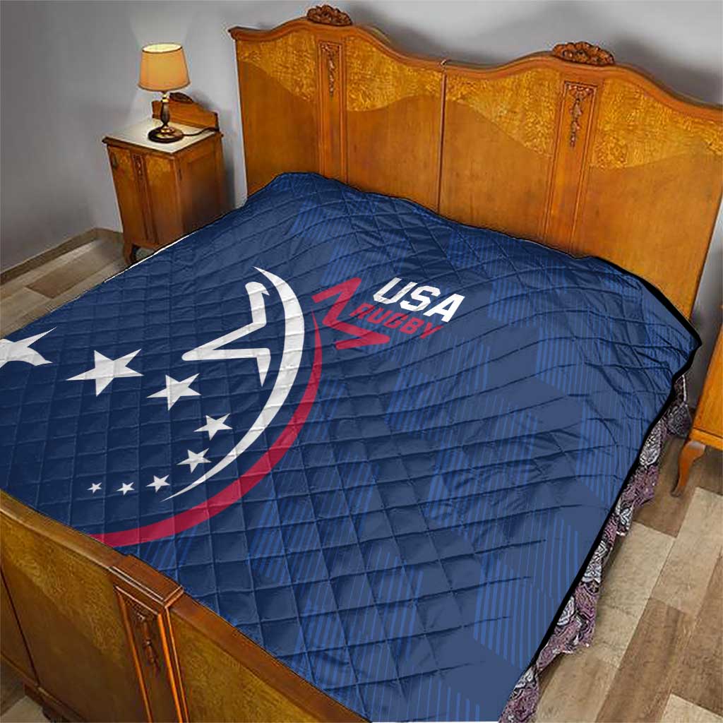 Blue USA Rugby quilt on bed, quilted top with USA Rugby logo and eagle graphic