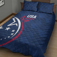 Blue USA Rugby quilt with diagonal stripe pattern and circular emblem across bed