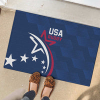 Blue rubber doormat with USA Rugby eagle emblem and stars, shown on floor