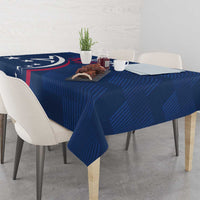 Blue rugby tablecloth with USA logo and red slash, set across a dining table