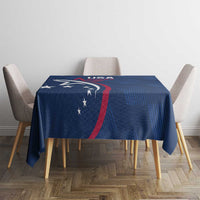 Blue rugby tablecloth with USA eagle and red stripe, on a table with chairs