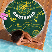 Round green beach blanket with tassel fringe, 'AUSTRALIA' and dotted wave patterns