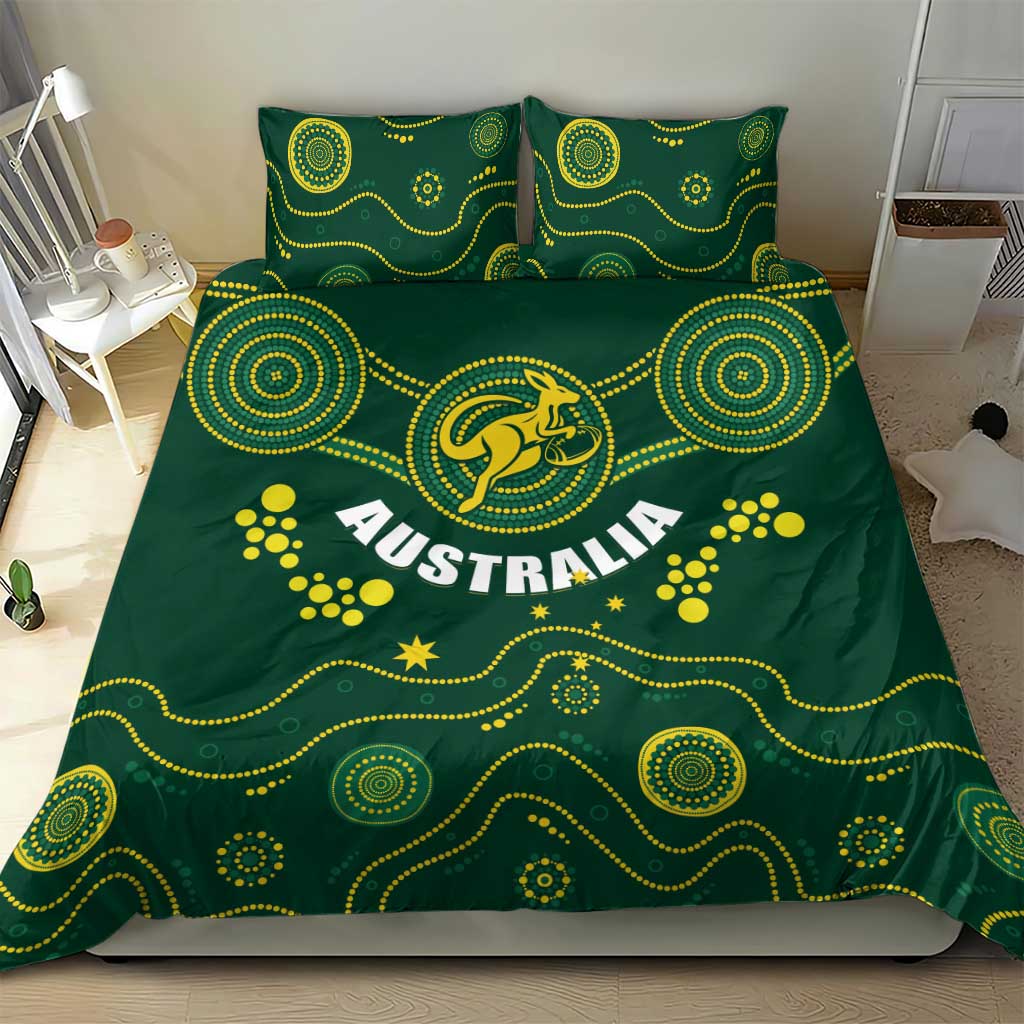 Green duvet cover and matching pillowcases with yellow Australia crest and circular motifs