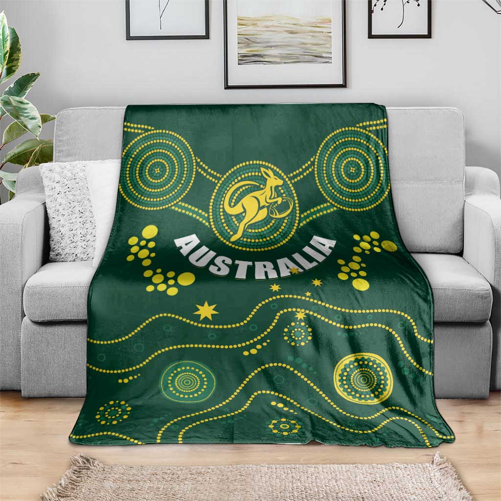 Green Australia rugby blanket featuring Wallabies kangaroo emblem on a couch