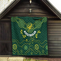 Australia rugby quilt hanging on barn wall, dark green with yellow Wallabies and paw prints