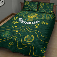 Green quilt and two pillowcases with Australia lettering, kangaroo center, and dot pattern waves