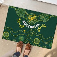 Green rubber doormat outdoors with yellow kangaroo emblem and 'AUSTRALIA' design
