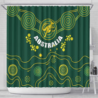 Green shower curtain panel with kangaroo Australia logo, star emblem, and gold dotted spirals