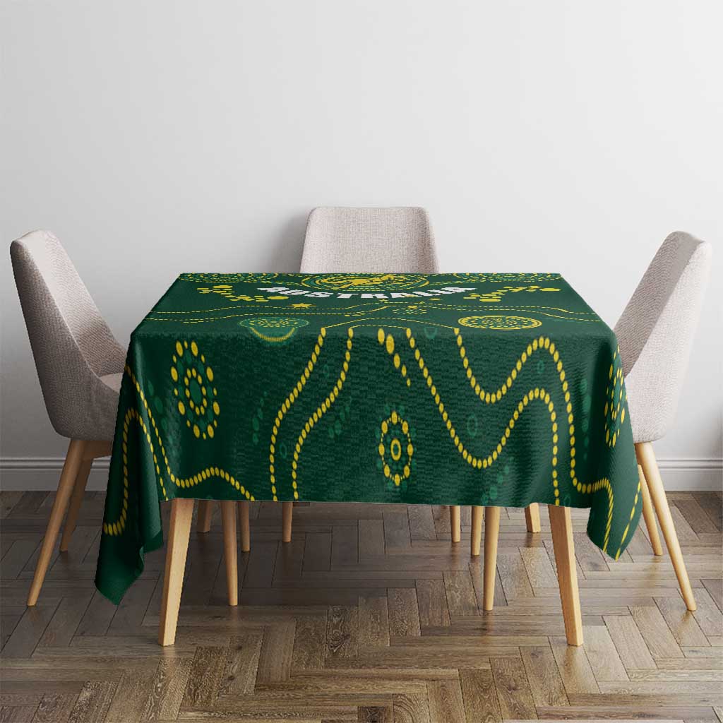 Green rugby tablecloth with yellow pattern and emblem, centered on dining table