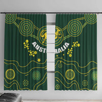 Front view of dark green curtains with gold paw prints, stars, and Australia Wallabies lettering