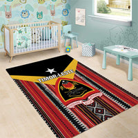 Rectangular area rug with red and black striped pattern, yellow banner, Timor-Leste crest