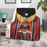 Timor-Leste flag blanket with black base, yellow star, red vertical stripes and crest