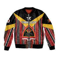 Black bomber jacket with zip, Timor-Leste text and red/yellow striped Tais pattern