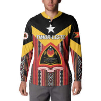 Personalized button sweatshirt on model, Timor-Leste crest graphic centered, patterned sleeves