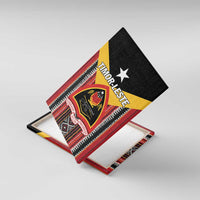 Tilted canvas wall art showing Timor-Leste crest, white star, and red/yellow/black striped design