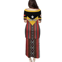 Long dress with yellow collar trim and diamond Tais-style pattern on red fabric