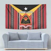 Timor-Leste tapestry featuring central crest, star above, and red-and-black vertical stripe pattern.