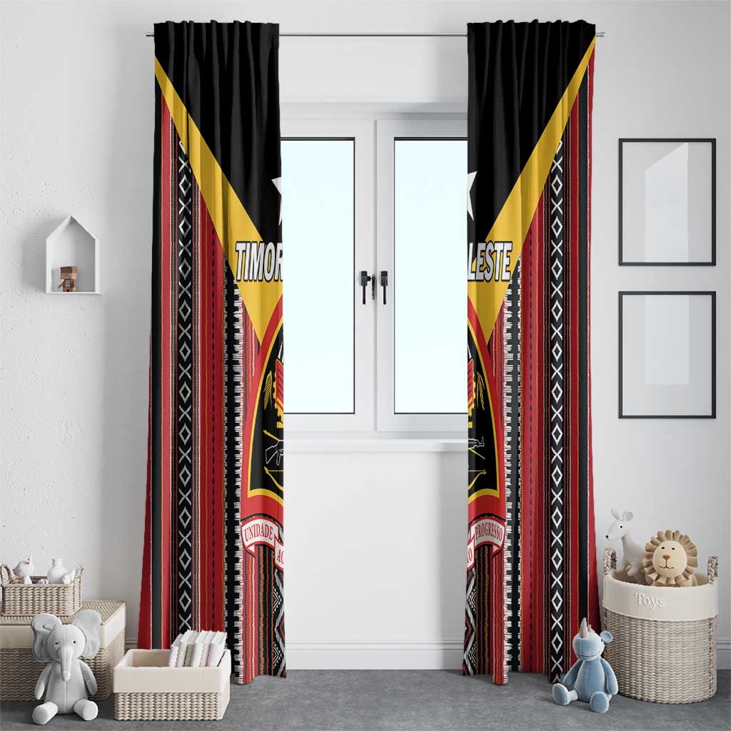 Paired black window curtain panels with red vertical stripes and yellow geometric diamond trim