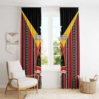 Black curtain panels with red and yellow side stripes and central Timor-Leste crest