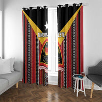 Black window curtains with red stripe borders, repeating motifs, and central Timor-Leste crest