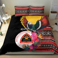 Black bedding set with duvet cover and pillows featuring pigeon, floral burst, and crest
