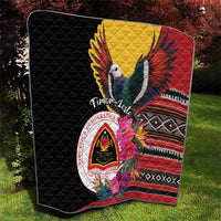 Black quilt with large bird and floral hibiscus, red yellow panel, and diamond pattern