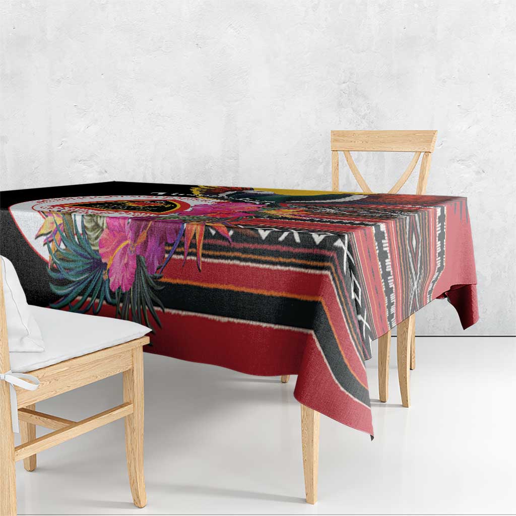Black tablecloth with side drape, showing tropical bird and floral details over stripes