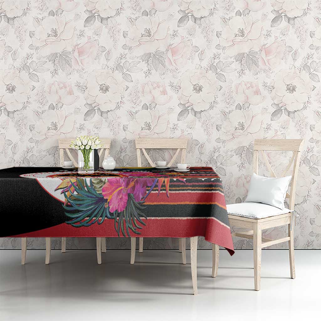 Black tablecloth on dining set with hibiscus and vivid multicolor geometric stripes