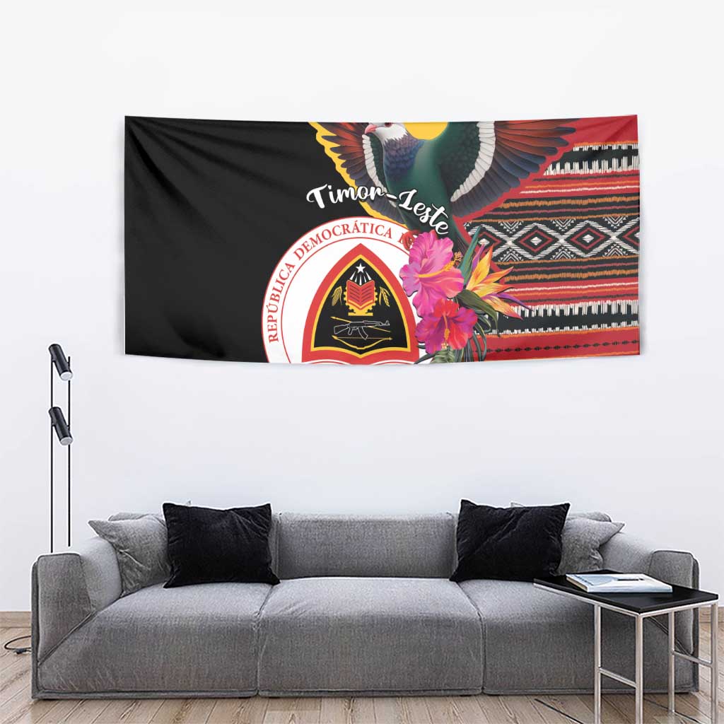 Black Timor-Leste tapestry showing imperial pigeon, hibiscus flowers, and stylized textile bands