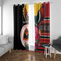 Black window curtain panels with colorful Timor-Leste birds, hibiscus flowers, and geometric bands