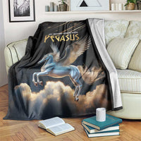 Black Pegasus blanket with winged horse graphic and clouds, draped over couch